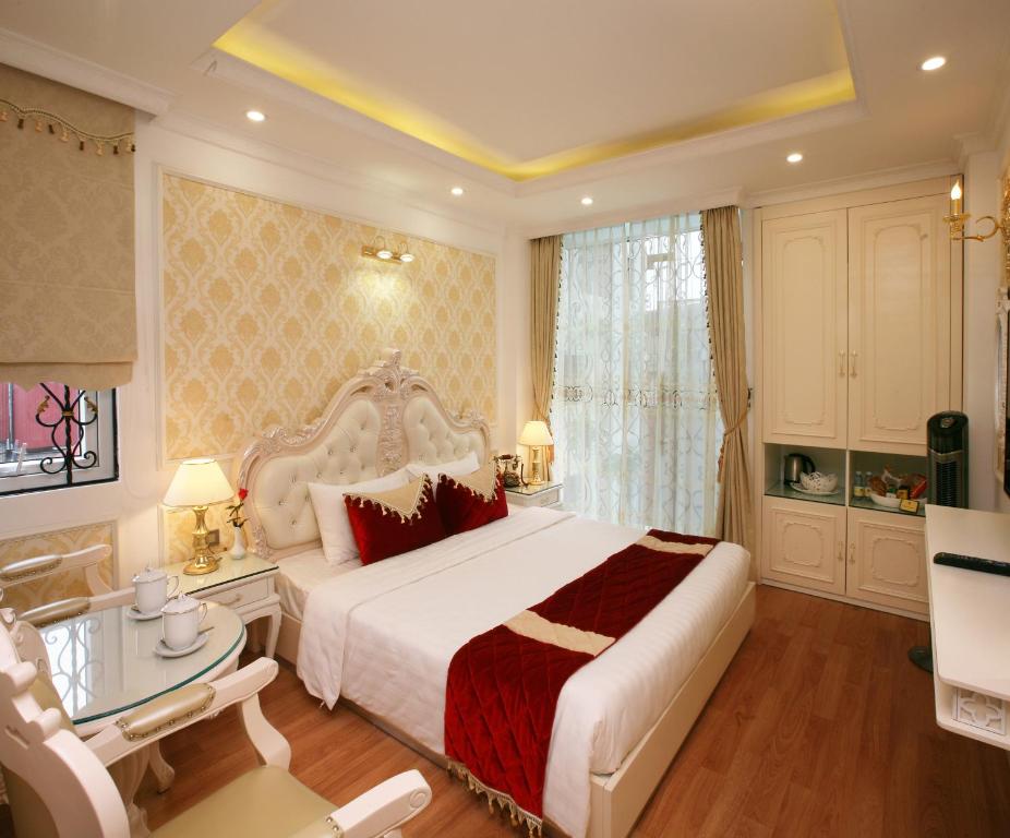 Двухместный (Королевский двухместный номер Делюкс с 1 кроватью или 2 отдельными кроватями) отеля Hanoi Guest House Royal, Ханой
