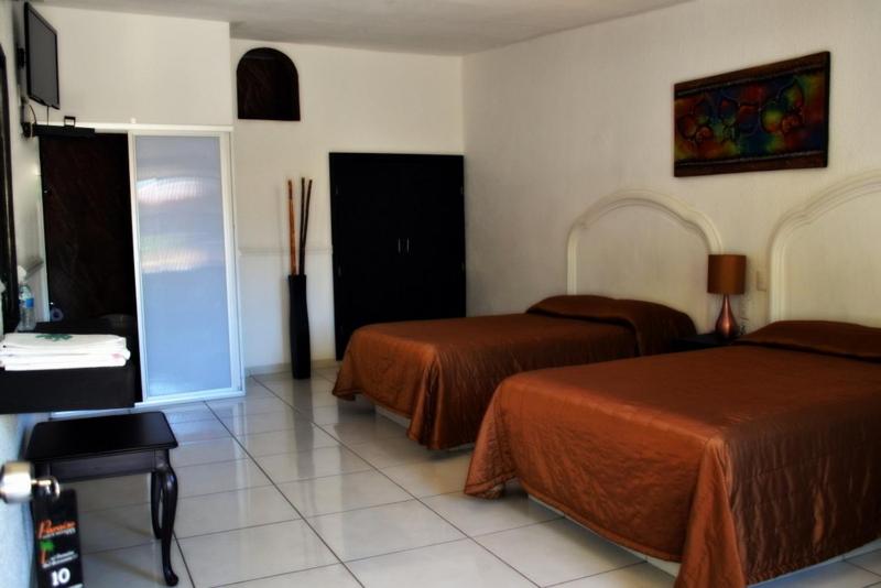 Двухместный (Двухместный номер с 2 двуспальными кроватями) отеля Hotel Paraiso, Тепик