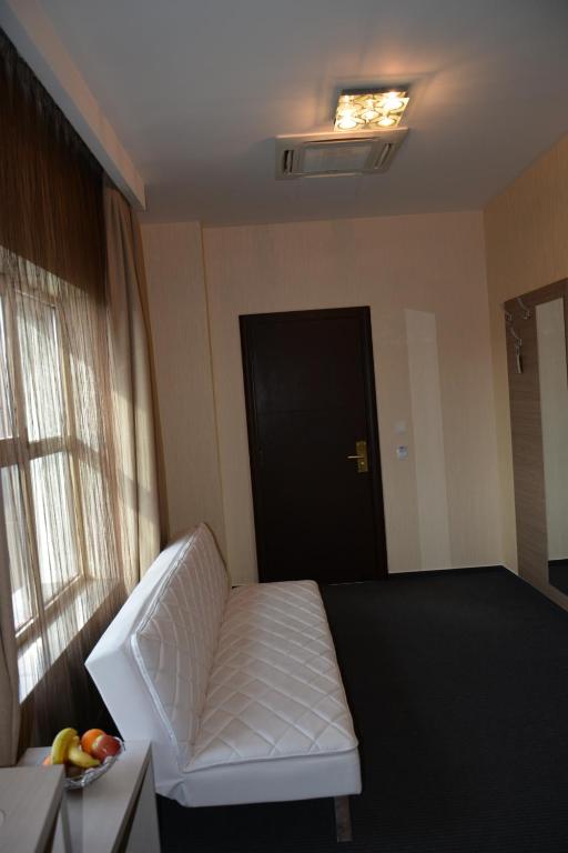 Двухместный (Улучшенный двухместный номер с 1 кроватью или 2 отдельными кроватями) отеля Albert Hotel, Плоешти