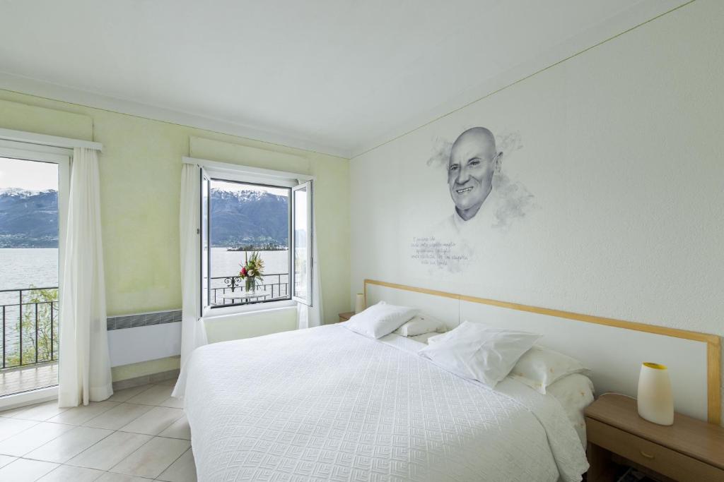 Двухместный (Двухместный номер с 2 отдельными кроватями и балконом, вид на озеро) отеля Art Hotel Ristorante Posta Al Lago, Аскона