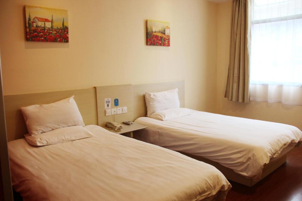 Двухместный (Двухместный номер с 2 отдельными кроватями) отеля Hanting Express Yantai North Road, Яньтай