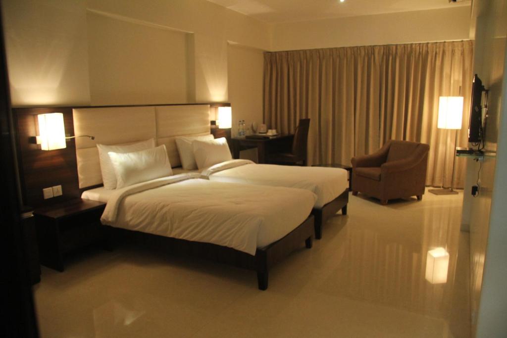 Двухместный (Двухместный номер Делюкс с 1 кроватью или 2 отдельными кроватями) отеля Hotel Beacon T2, Мумбай