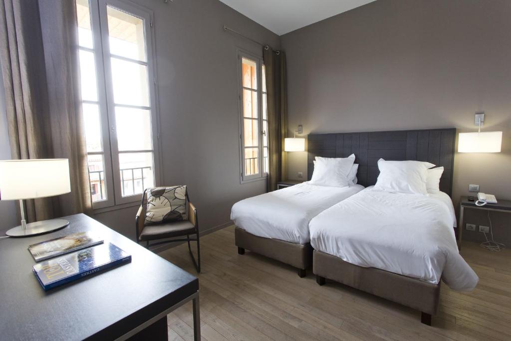 Двухместный (Двухместный номер с 2 отдельными кроватями) отеля Grand Hôtel de Castres, Кастр
