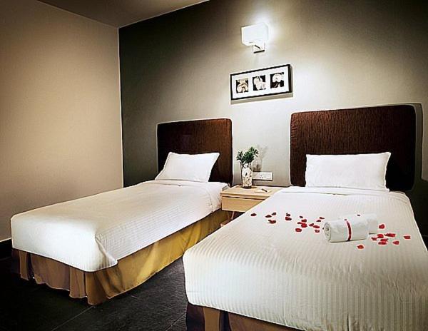 Двухместный (Улучшенный двухместный номер с 2 отдельными кроватями (без окон)) отеля Sky Hotel @ Selayang, Куала-Лумпур
