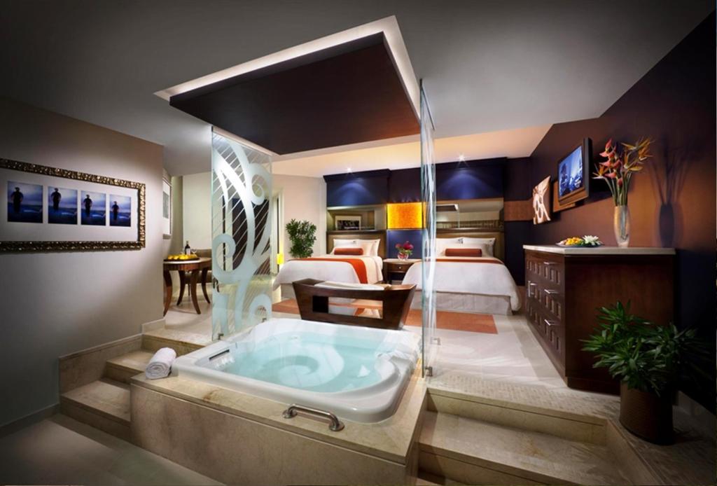 Двухместный (Классический двухместный люкс «Карибиан Сэнд» с 1 кроватью) курортного отеля Hard Rock Hotel & Casino Punta Cana All Inclusive, Пунта-Кана