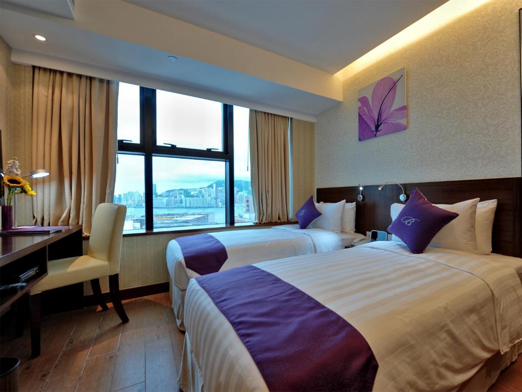Двухместный (Улучшенный двухместный номер с 2 отдельными кроватями и видом на гавань.) отеля The Bauhinia Hotel - Tsim Sha Tsui, Гонконг (город)