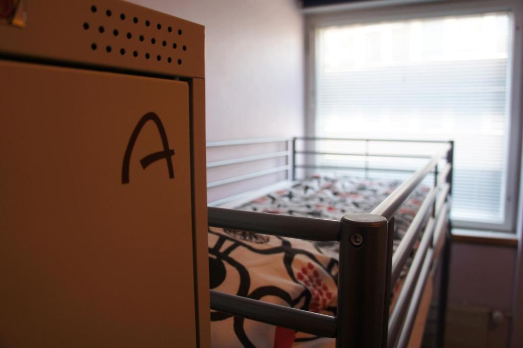 Номер (Спальное место на двухъярусной кровати в общем номере для женщин) хостела SweetDream Guesthouse, Хельсинки