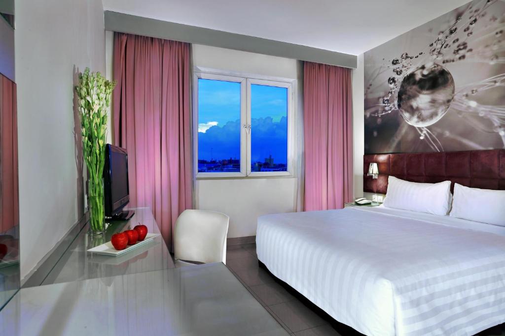 Двухместный (Двухместный номер Делюкс с 1 кроватью или 2 отдельными кроватями) отеля Aston Cengkareng City Hotel and Convention Center, Джакарта