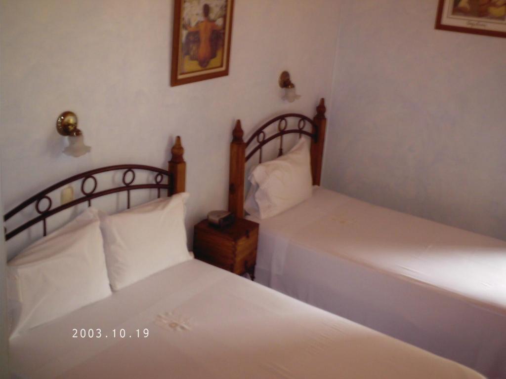 Четырехместный (Двухместный номер с 2 двуспальными кроватями) отеля Casa del Agua, Гуанахуато