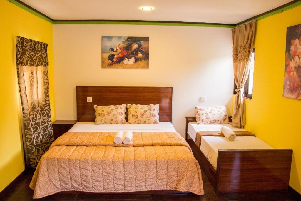 Номер (Семейное шале - 3 взрослых) курортного отеля Green Village Langkawi Resort, Лангкави
