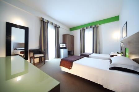 Двухместный (Двухместный номер с 1 кроватью или 2 отдельными кроватями) отеля Hotel Trieste, Римини
