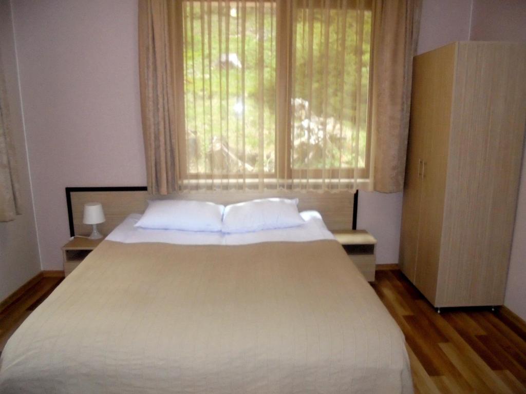 Двухместный (Двухместный номер с 1 кроватью или 2 отдельными кроватями и террасой) гостевого дома Villa Ivelia, Доспат