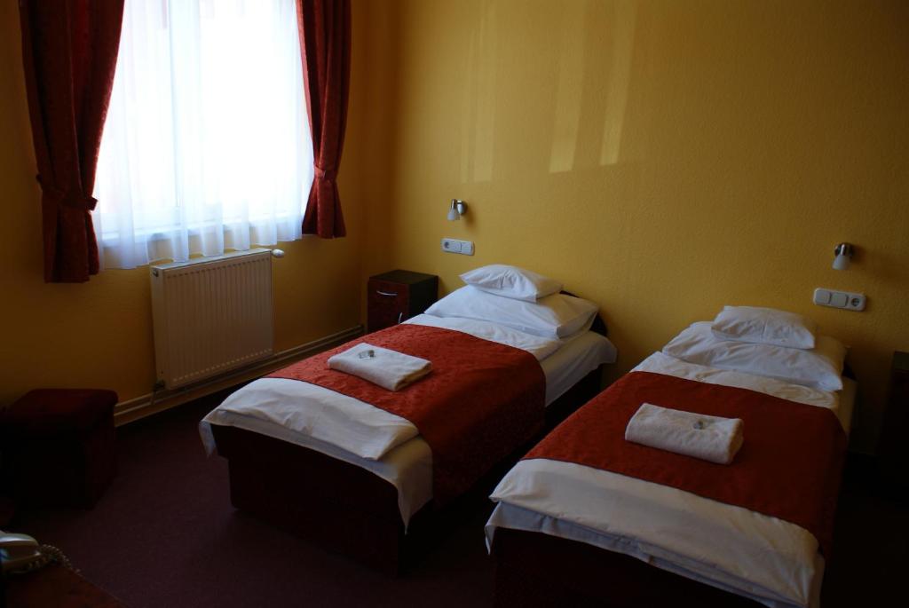 Двухместный (Стандартный двухместный номер с 2 отдельными кроватями) отеля Hotel Palota City, Будапешт