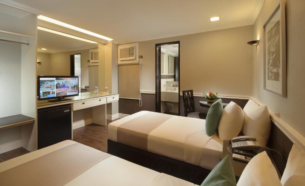 Двухместный (Стандартный двухместный номер с 2 отдельными кроватями) отеля MetroCentre Hotel, Панглао
