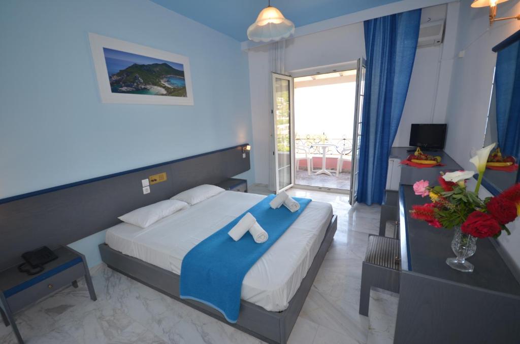 Двухместный (Двухместный номер с 1 кроватью или 2 отдельными кроватями и видом на море) отеля Hotel Elena Ermones, Эрмонес
