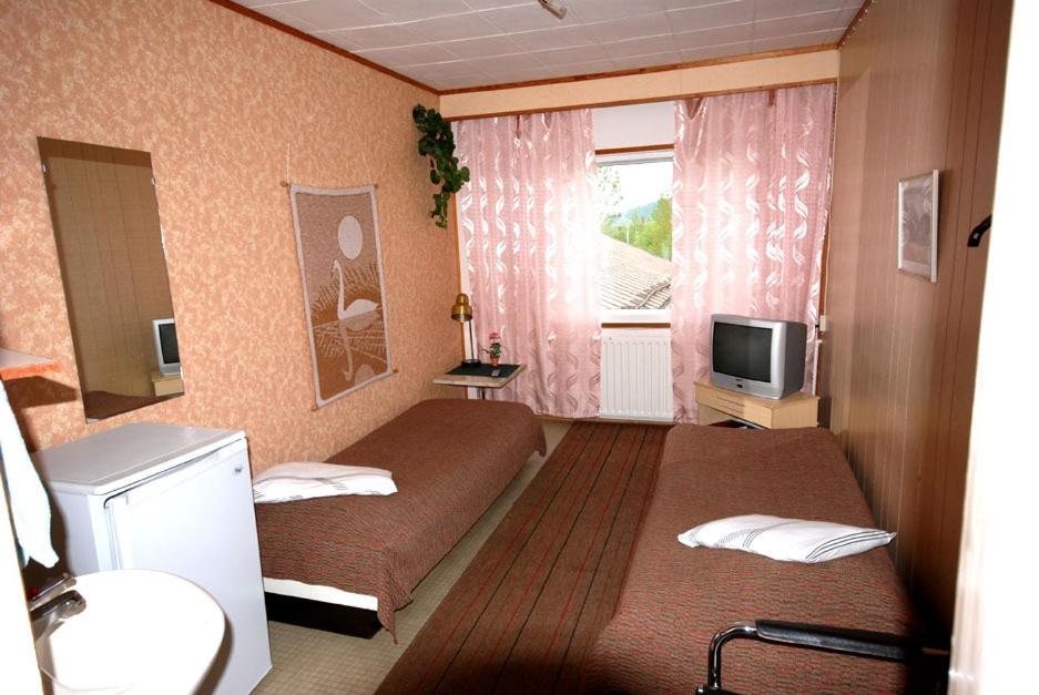 Двухместный (Двухместный номер с 1 кроватью или 2 отдельными кроватями) гостевого дома Jämsän Gasthaus, Ямся