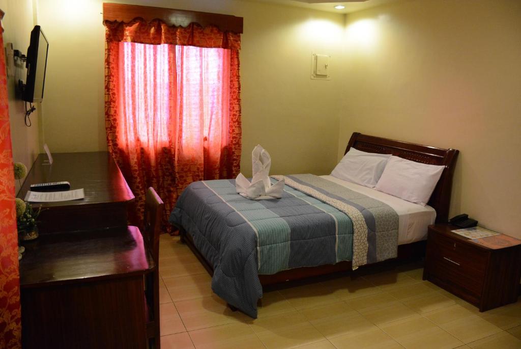 Двухместный (Стандартный двухместный номер с 1 кроватью) отеля Siayan Travellers Inn, Манила