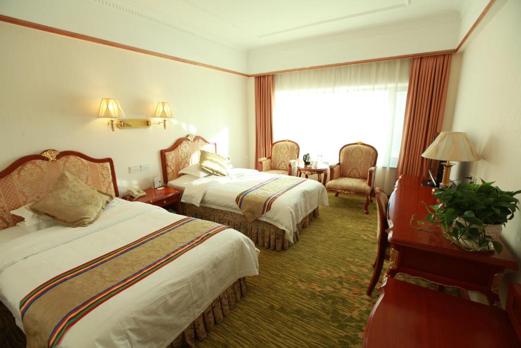 Двухместный (Представительский двухместный номер с 2 отдельными кроватями) отеля Yanbian Baishan Hotel, Яньцзи