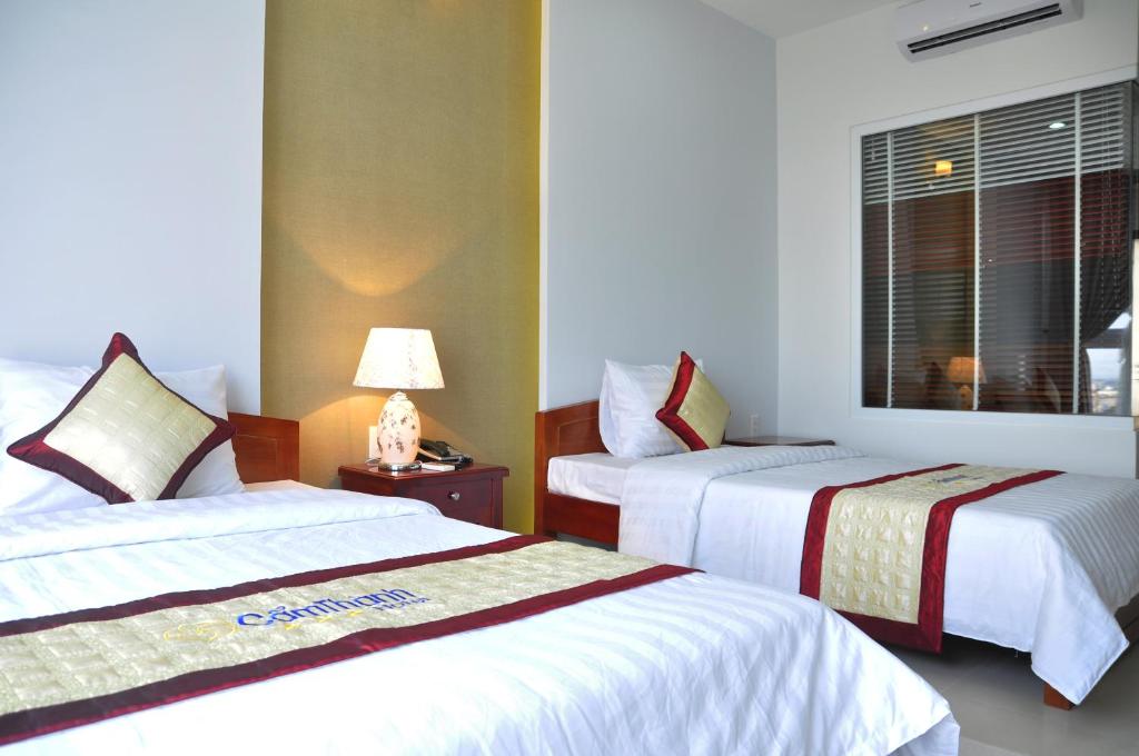 Двухместный (Двухместный номер Делюкс с 2 отдельными кроватями) отеля Cam Thanh Hotel, Куангнгай