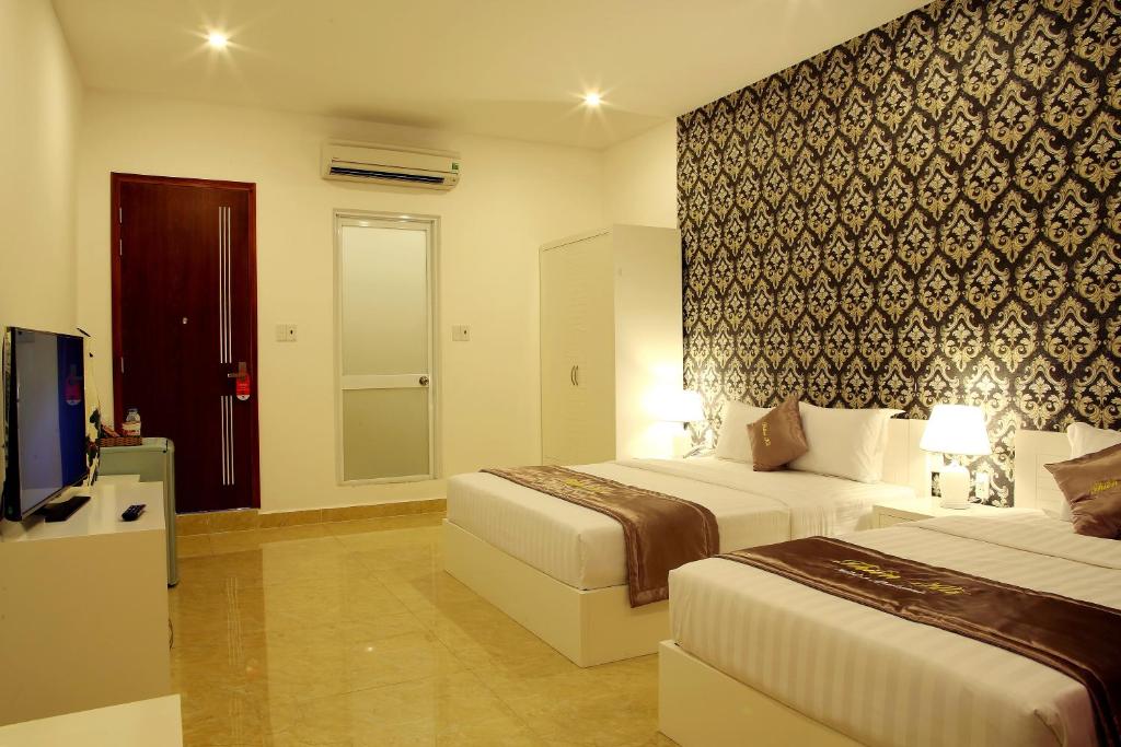 Трехместный (Представительский трехместный номер) апарт-отеля Thien Ha Hotel & Apartment, Хошимин