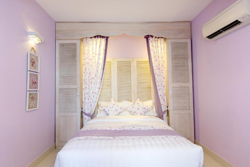 Двухместный (Улучшенный двухместный номер с 1 кроватью) отеля Hotel L' Odéon Phu My Hung, Хошимин