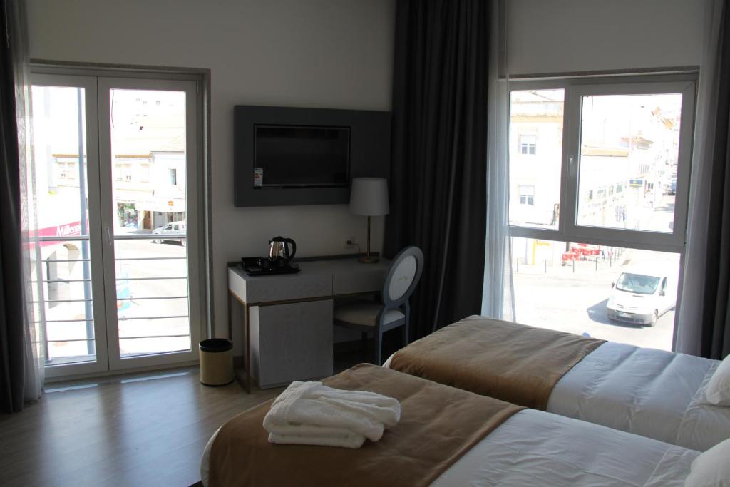 Двухместный (Специальное предложение - Двухместный номер с 1 кроватью или 2 отдельными кроватями) отеля Hotel José Régio, Понте-де-Лима