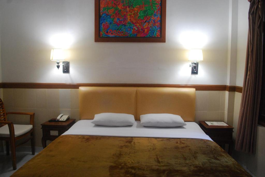 Двухместный (Стандартный двухместный номер с 1 кроватью или 2 отдельными кроватями и вентилятором) отеля Hotel Sorga Cottages, Кута