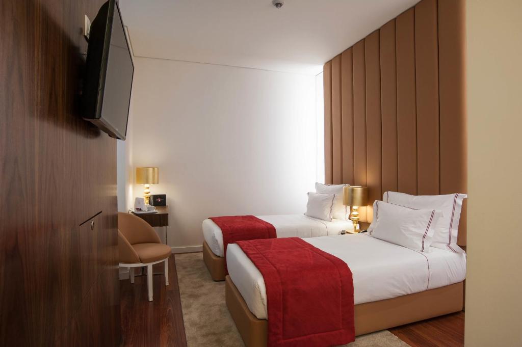 Двухместный (Двухместный номер с 2 отдельными кроватями и видом на внутренний двор) отеля The 7 Hotel, Лиссабон