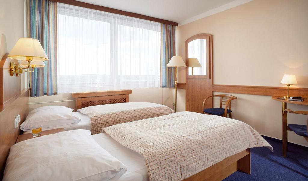 Двухместный (Двухместный номер с 1 кроватью или 2 отдельными кроватями) отеля Cernigov, Градец-Кралове