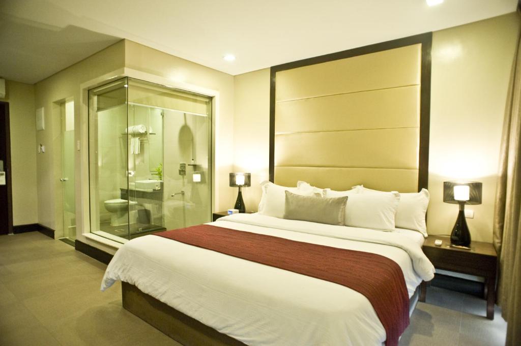 Двухместный (Стандартный двухместный номер с 1 кроватью или 2 отдельными кроватями) отеля Goldberry Suites and Hotel, Мактан