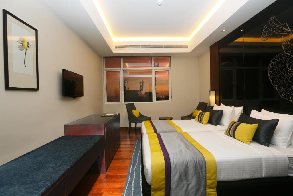 Двухместный (Двухместный номер Делюкс с 1 кроватью или 2 отдельными кроватями, бесплатная поздняя регистрация отъезда до 16:00 и ранняя регистрация заезда с 10:00) отеля Renuka City Hotel, Коломбо