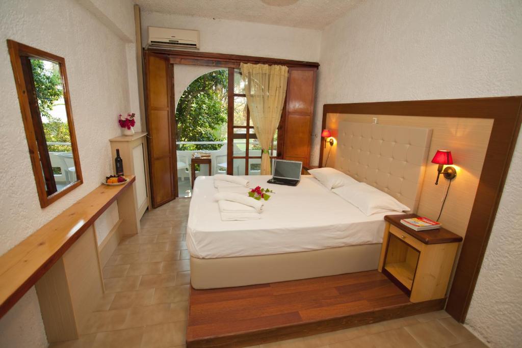 Двухместный (Двухместный номер с 1 кроватью или 2 отдельными кроватями) апарт-отеля Damnoni Paradise, Дамнони