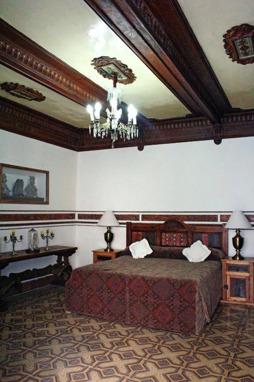 Двухместный (Люкс с кроватью размера «king-size») отеля Hotel Boutique Casa de la Palma, Пуэбла