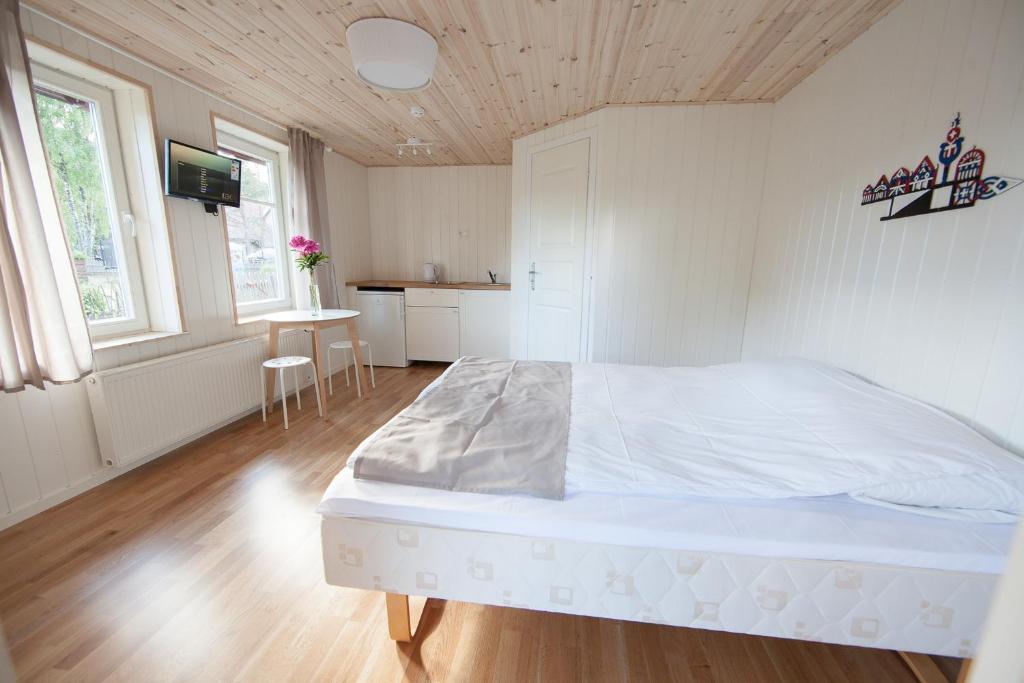 Двухместный (Двухместный номер с 1 кроватью или 2 отдельными кроватями и террасой) гостевого дома Pervalkos vetrunges, Неринга