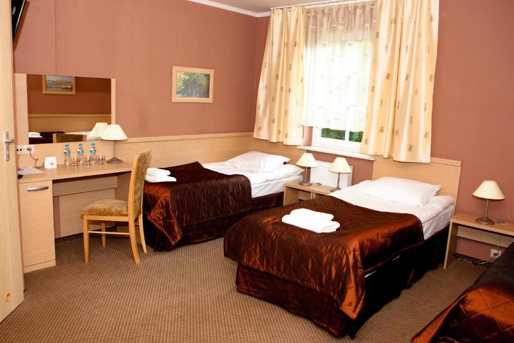 Двухместный (Двухместный номер с 1 кроватью или 2 отдельными кроватями) отеля Hotel Carskie Koszary, Замосць