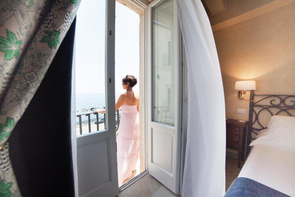 Двухместный (Классический двухместный номер с 1 кроватью или 2 отдельными кроватями с видом на море) отеля Algilà Ortigia Charme Hotel, Сиракузы