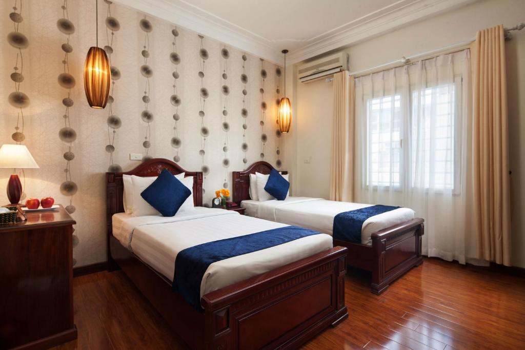 Двухместный (Двухместный номер Делюкс с 2 отдельными кроватями) отеля Hanoi Golden Moon Hotel, Ханой