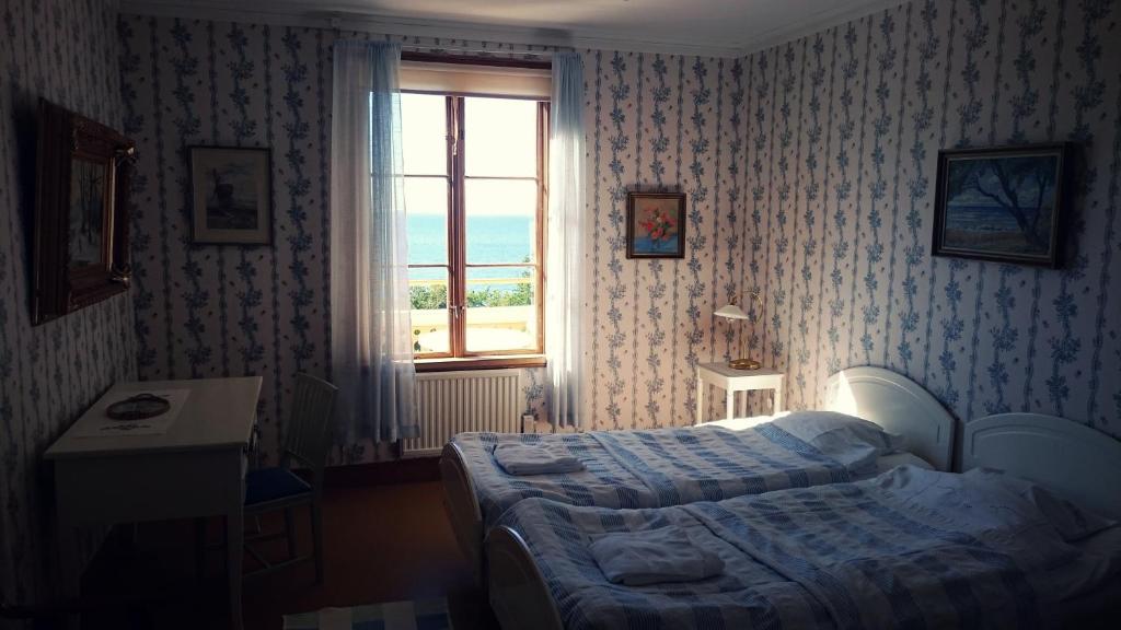 Двухместный (Двухместный номер с 2 отдельными кроватями и видом на море) гостевого дома Fridhems Pensionat, Висбю