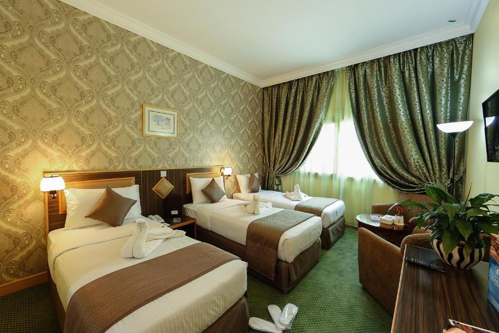 Трехместный (Трехместный номер) отеля Jonrad Hotel, Дубай