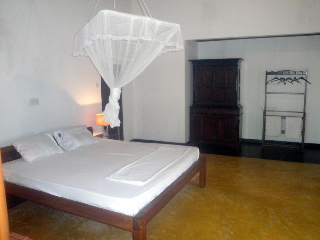 Двухместный (Двухместный номер Делюкс с 1 кроватью) курортного отеля Priyanka Villa, Бентота