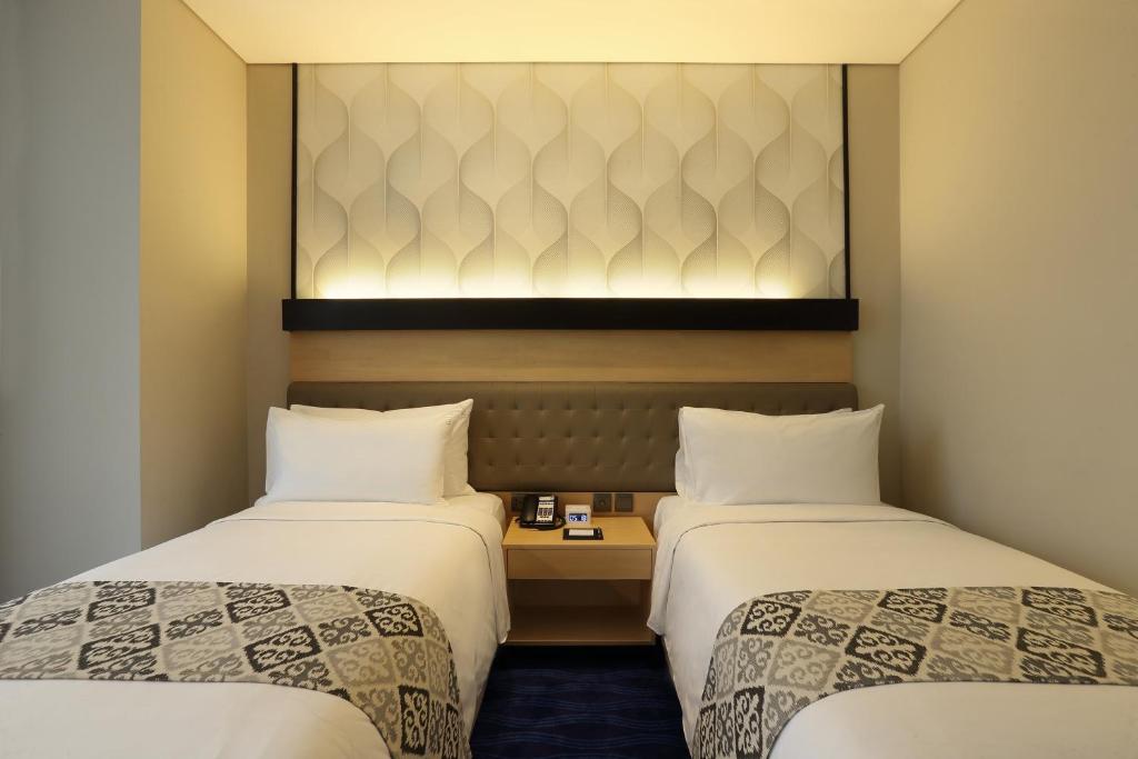 Двухместный (Стандартный двухместный номер с 2 отдельными кроватями - Для некурящих) отеля Holiday Inn Express Jakarta Thamrin, Джакарта