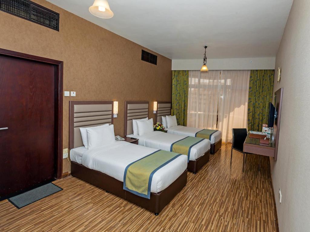 Трехместный (Стандартный трехместный номер) отеля Florida International Hotel, Дубай