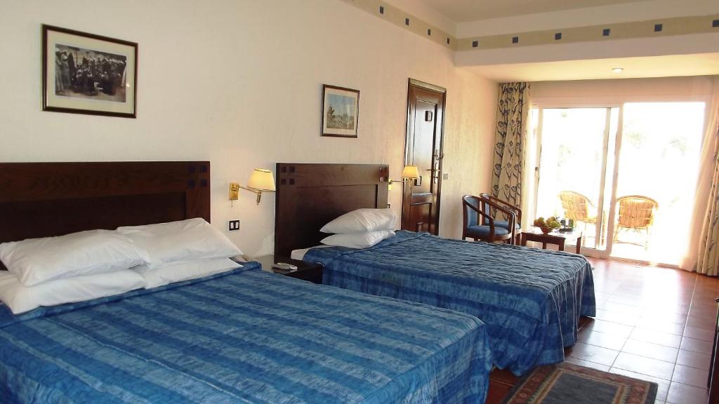 Двухместный (Стандартный двухместный номер с боковым видом на море) курортного отеля Dome Marina Hotel & Resort Ain Sokhna, Айн-Сохна
