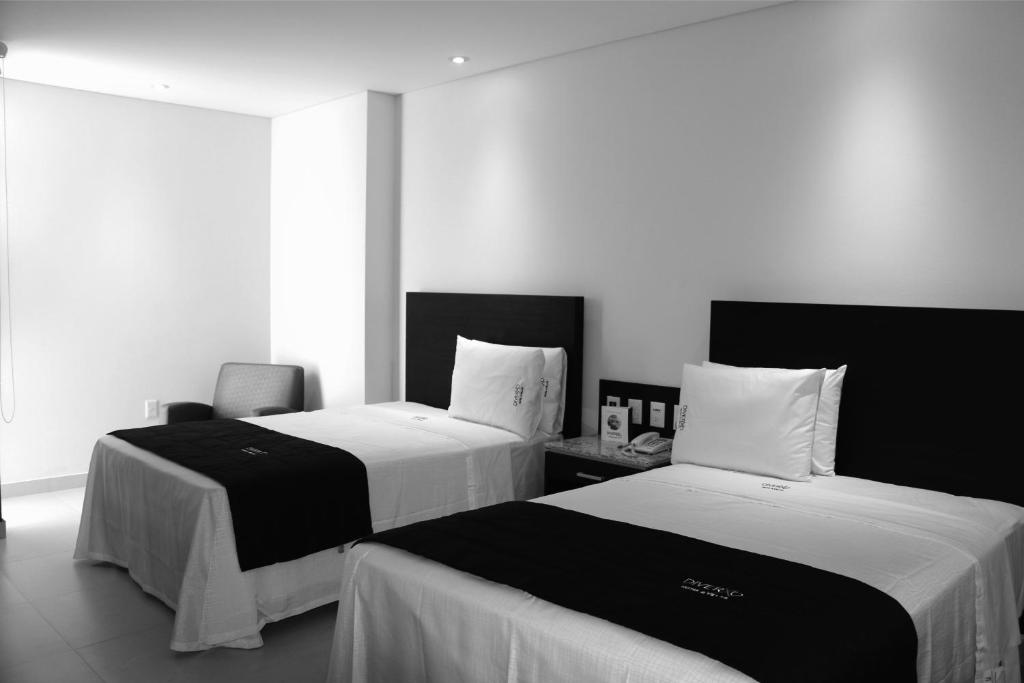 Четырехместный (Двухместный номер с 2 двуспальными кроватями) отеля Diverxo Hotel & Villas, Тустла-Гутьеррес