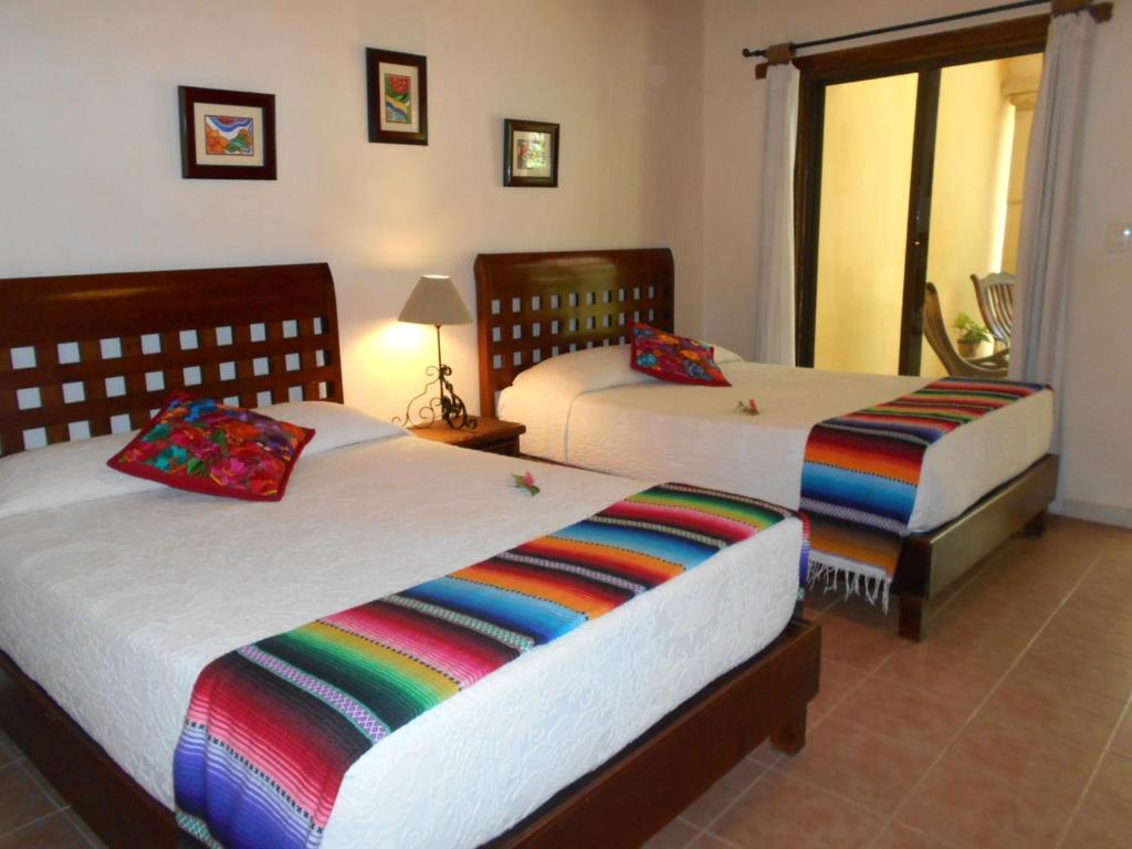 Двухместный (Стандартный двухместный номер с 2 отдельными кроватями) отеля Hacienda Chichen Resort and Yaxkin Spa, Чичен-Ица