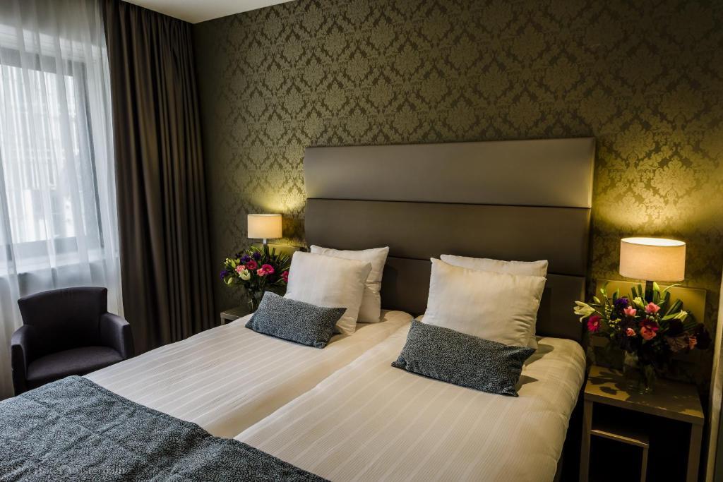 Двухместный (Представительский двухместный номер с 2 отдельными кроватями) отеля Ozo Hotel, Амстердам