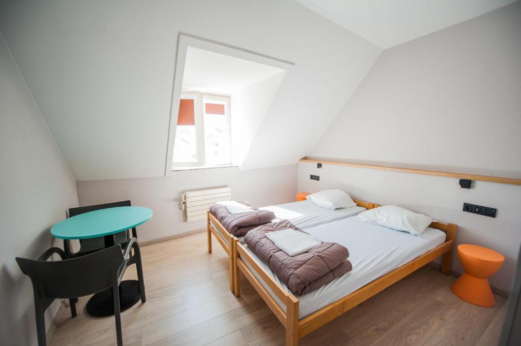 Двухместный (Двухместный номер с 2 отдельными кроватями) хостела Jacques Brel Youth Hostel, Брюссель