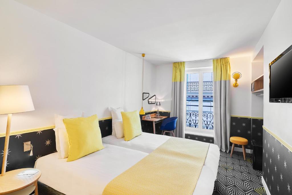 Двухместный (Стандартный двухместный номер с 2 отдельными кроватями) отеля Hôtel Augustin - Astotel, Париж