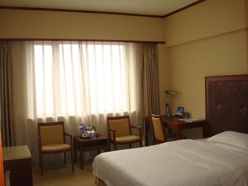 Двухместный (Улучшенный двухместный номер бизнес-класса с 1 кроватью) отеля Dalian Royal Hotel, Далянь