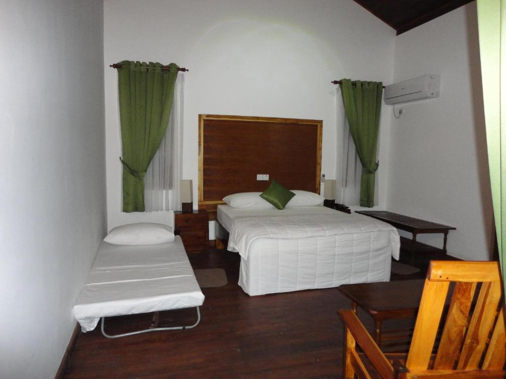 Двухместный (Бюджетный двухместный номер с 2 отдельными кроватями) курортного отеля Naaval, Баттикалоа